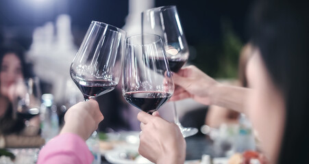 group of red wine glasses on night party cerebrate