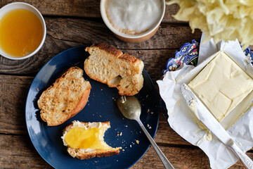 Breakfast. Bread with butter and honey.