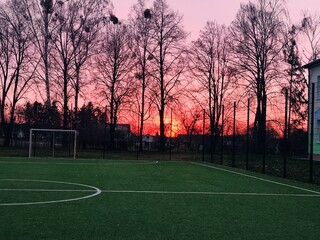 football field at sunset