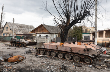 Fototapeta na wymiar War in Ukraine. Destroyed Russian military equipment in Bucha, Ukraine