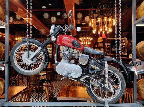 Dubai, UAE- March 31 2022: A showroom of vintage classic and premium motor bikes with powerful engine and strong metallic body.