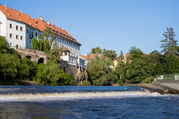 Fototapeta na wymiar River Vltava and weir in historic town of Český Krumlov, Czech Republic