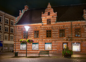 Historic Flensburgska House ( Flensburgska huset ), Old Town, Malmo, Sweden. Emty street in the old city centre in Malmo at night.