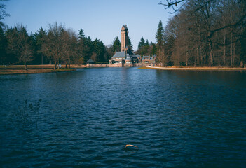 historical building next to lake
