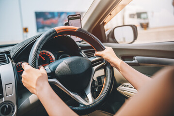 Close Up of Woman Driving a Car on Road - Transportation Concept