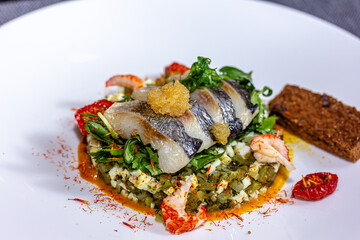 Herring or mackerel with cucumbers, eggs and shrimp