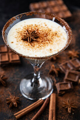 Christmas milk eggnog  cocktail with cinnamon, vanilla and sugar