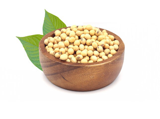 soybean seeds in wooden bowl with green leaves isolated on white background