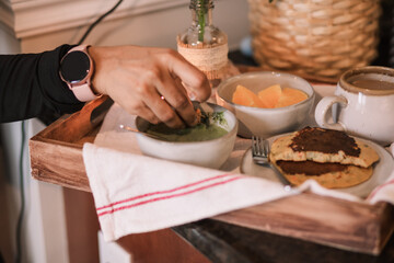 A woman is eating healthy food 