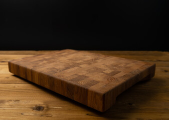 Massive wooden cutting board impregnated with oil