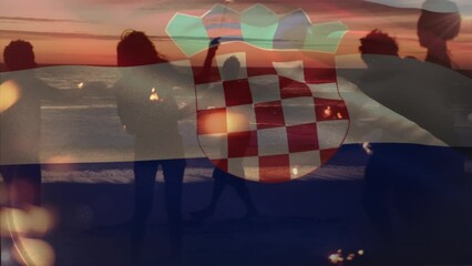 Animation of waving croatia flag over group of friend on the beach - Powered by Adobe