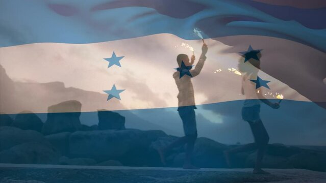Animation of waving of honduras flag over group of friends on the beach
