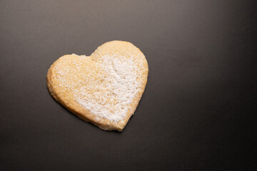 Shortbread in the shape of a heart isolated on white background.