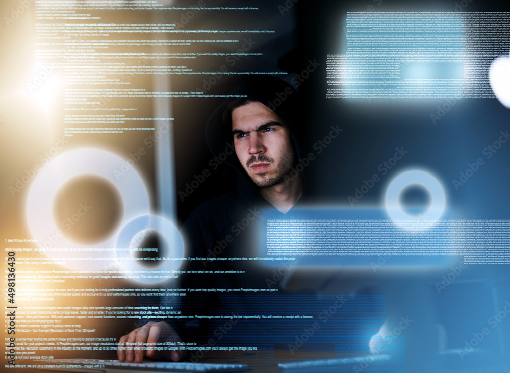Poster hes the master of metadata. shot of a focussed young computer programmer working on his coding late 