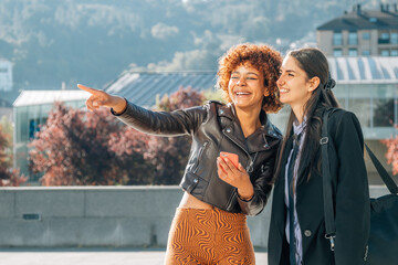 girl helping on the street to find an address