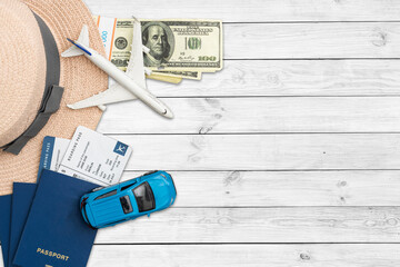 Hat, toy airplane, passport, money