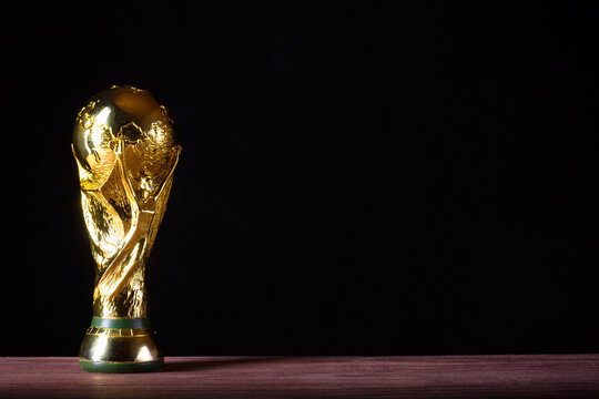 Moscow, Russia - April, 2022: FIFA World Cup Trophy against black background.