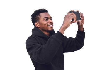 Portrait of happy smiling young african man taking selfie by smartphone isolated on white background