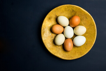 Naturally colored fresh raw chicken eggs