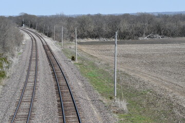 Train Tracks by a Rural Farm Field