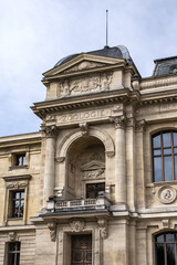 Obraz premium Architectural details of old Paris buildings: “Grand Gallery of the Evolution” - imposing Renaissance-revival building, built in 1889. Paris. France.