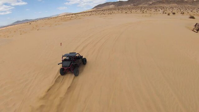 Offroad Dune Buggy Driving in the Desert Sand Dunes