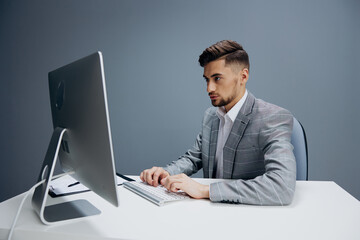 businessmen working at the computer in the office isolated background
