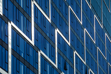 Obraz premium Modern building facade. Linear patterns on the modern office building. 