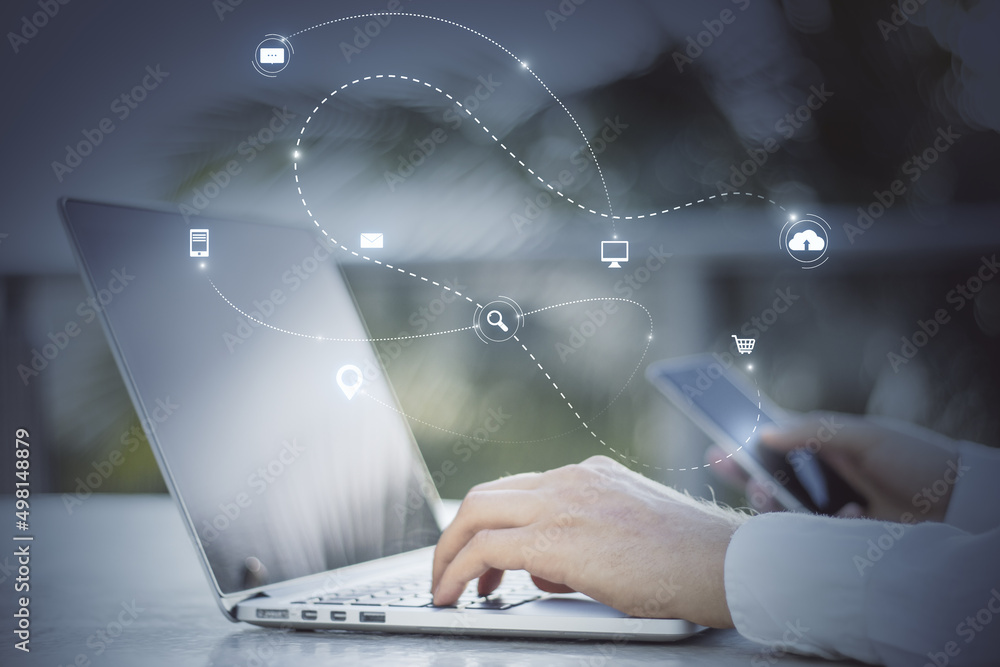 Poster close up of hand using laptop keyboard and smartphone with abstract seo search and communication hol