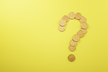 Abstract creative golden coin question mark on yellow backdrop with mock up place. Money,...