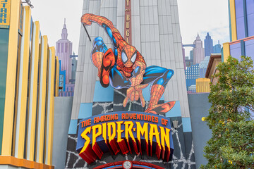 Fototapeta premium Giant Spiderman character above the entrance to the ride