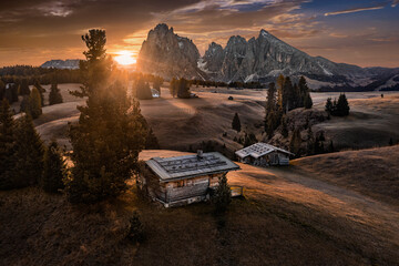 Alpe di Siusi, Italy - Aerial view of wooden cottage at Seiser Alm, a Dolomite plateau in South...