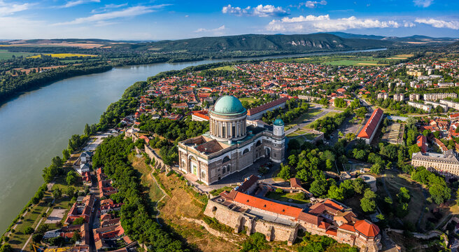 Esztergom, Hungary - Aerial panoramic view of Primatial Basilica of the Blessed Virgin Mary Assumed Into Heaven (Basilica of Esztergom) and city of Esztergom on a summer day with blue sky with clouds