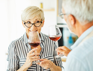 love kitchen senior glass woman couple home retirement happy food smiling husband wine together portrait