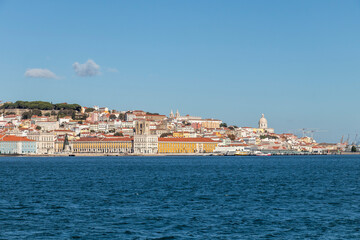 Fototapeta na wymiar Panoramic view of Lisbon Skyline as seen from Almada with waterfront of Tagus river, Portugal