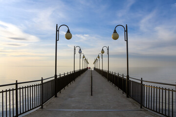 Pier in Miedzyzdroje. Lanterns symmetrically positioned.