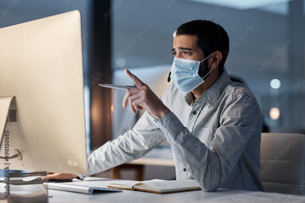 Poster hygiene standards as high as their customer service. shot of a masked young man using a headset and 