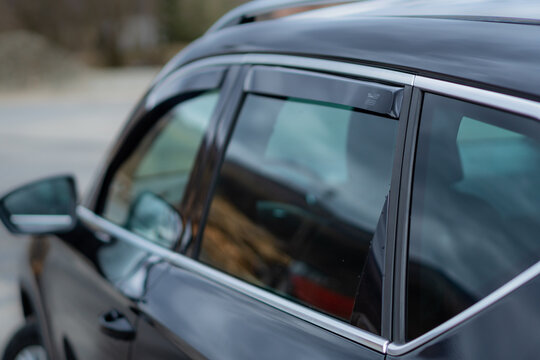 Cluj-Napoca, Cluj-Romania-04.02.20220Heki wind deflectors front and back mounted on a superb Seat Ateca SUV, isolated in an empty parking lot