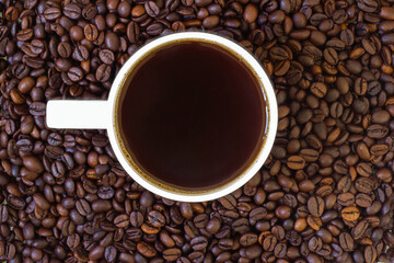 coffee beans in the cup and in the background