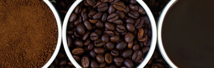 Top view close-up coffees brewed, ground and roasted coffee mugs together