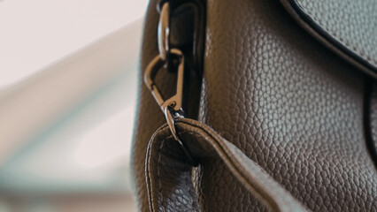 Close up part of women's leather bag