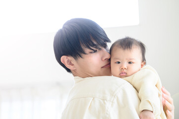 A father and his baby.