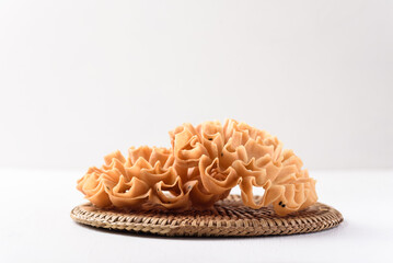 Local Thai snacks that look like flower on white background