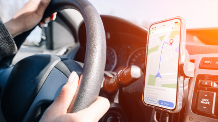 Gps navigator map system. Global positioning system on smartphone screen in auto car on travel...