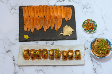 An assortment of sushi utilizing salmon