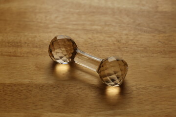 Glass Paperweight with Wood Background