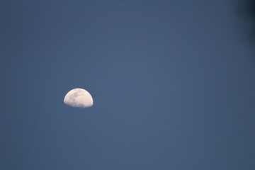 Half Moon With Clear Blue Sky 