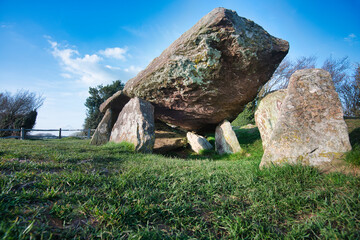 Arthur's Stone,low angle,surrounded by grass,Neolithic unearthed chambered...