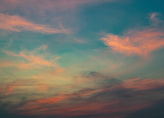 Naklejka na ściany i meble Colorful blue sky background with the orange cloud, sunset at twilight. Nature abstract concept.