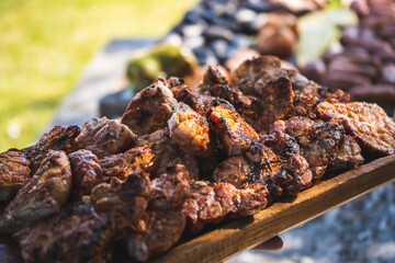 Freshly grilled sweetbreads served on wooden tray